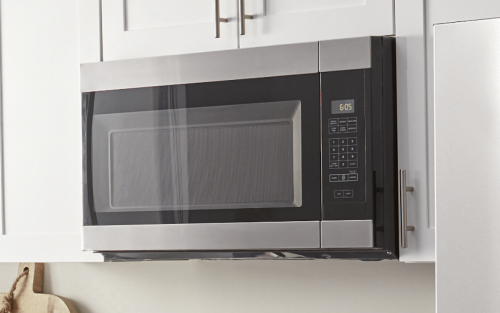 Amana® built-in microwave installed in white cabinetry